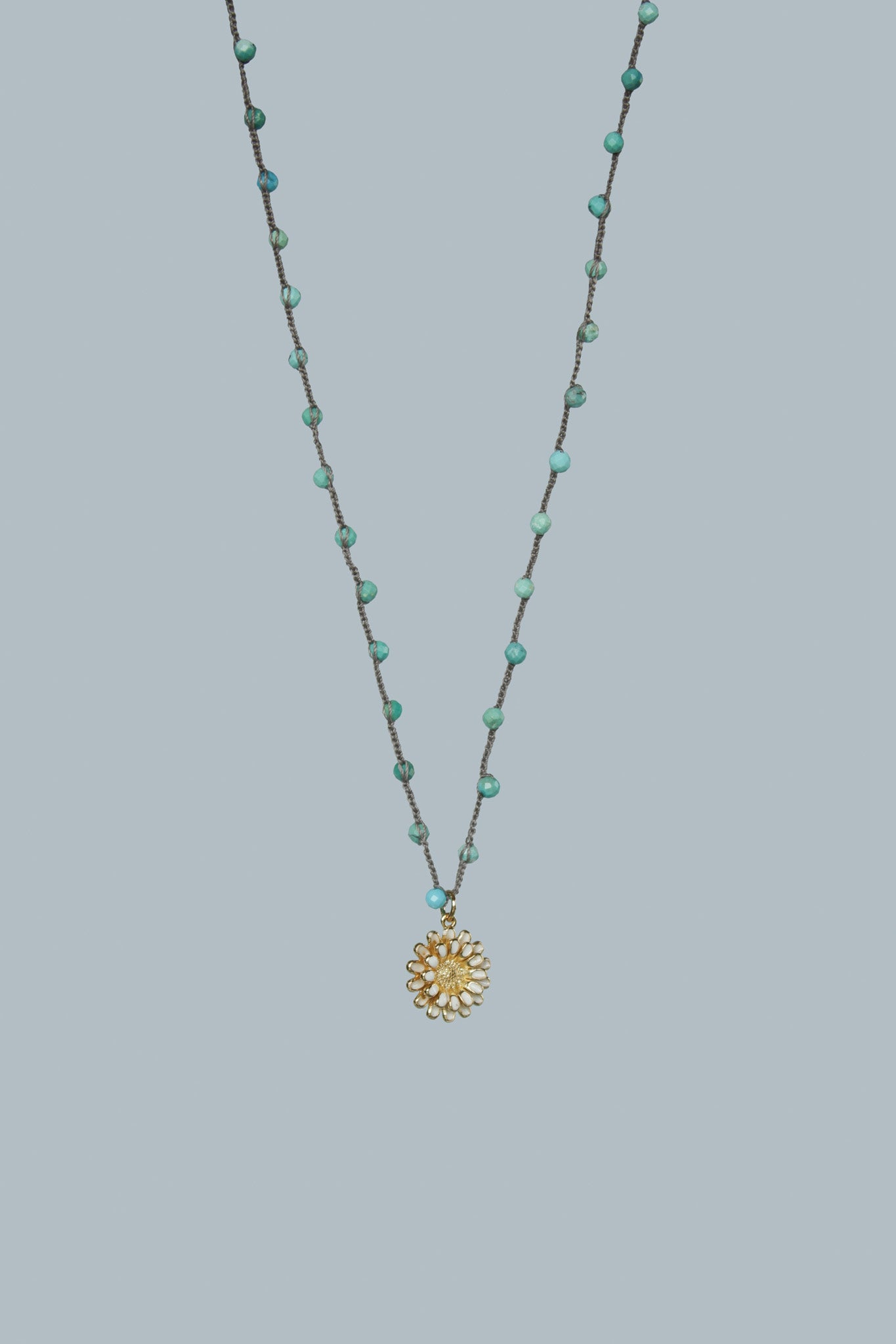 Turquoise Beaded Necklace with White Flower Charm